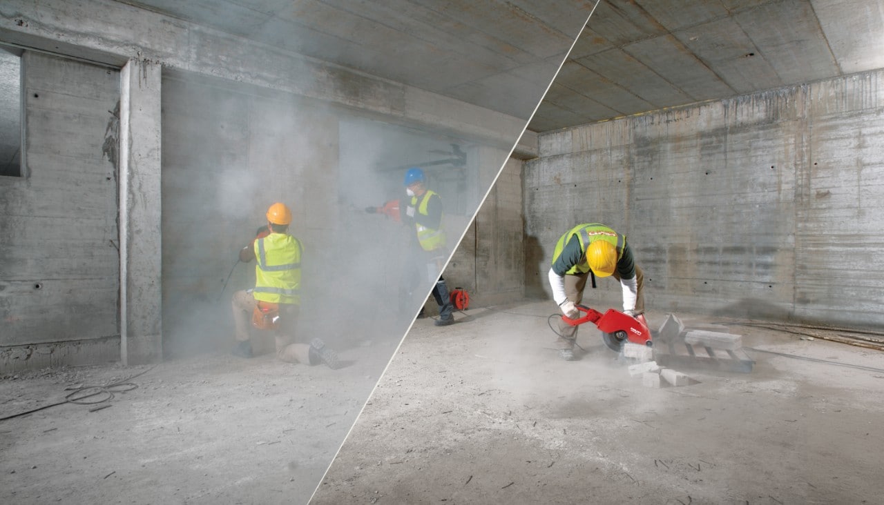 Tool drilling into cement and stirring up dust